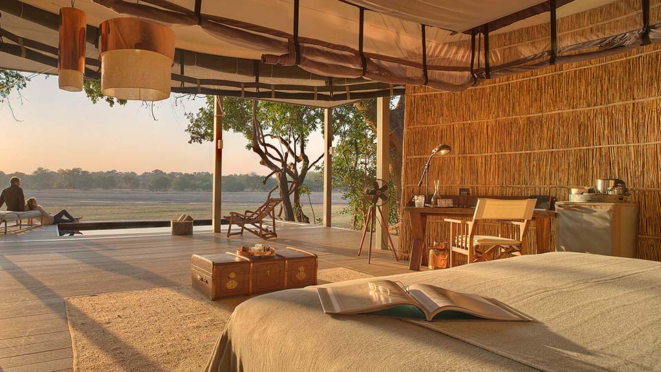 Watch the wild life from your bed at Time + Tide Chinzombo, South Luangwa, Zambia