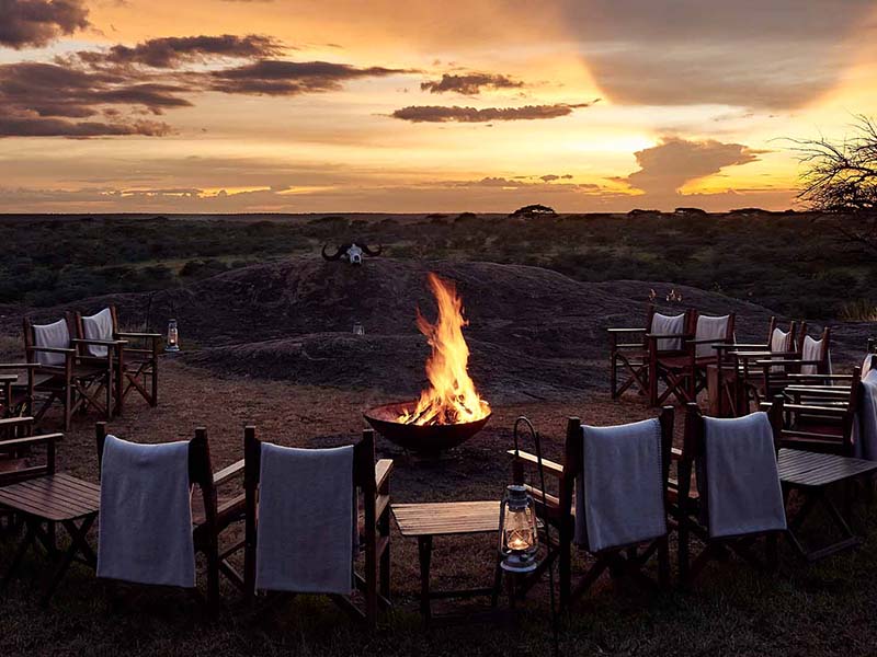 Stunning fireplace view from Sanctuary Kichakani Serengeti Camp, Tanzania
